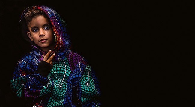 indigenous child in hoodie