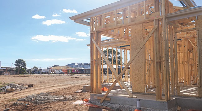 Building site with house being built Building site with house being built
