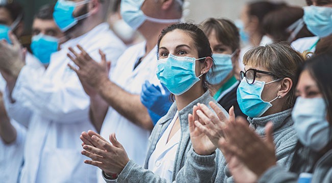 healthcare workers clapping