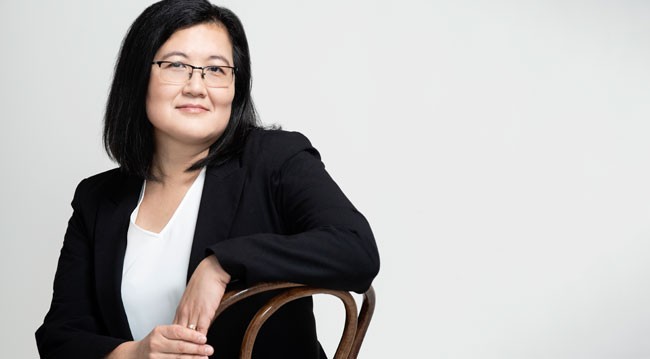 Ming Long on a chair Ming Long on a chair