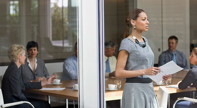 Woman reflecting on meeting Woman reflecting on meeting