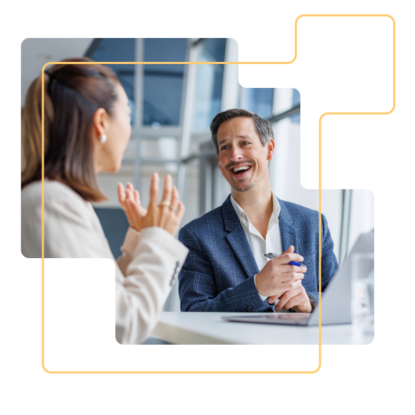 two people laughing with premium mentoring brand overlay